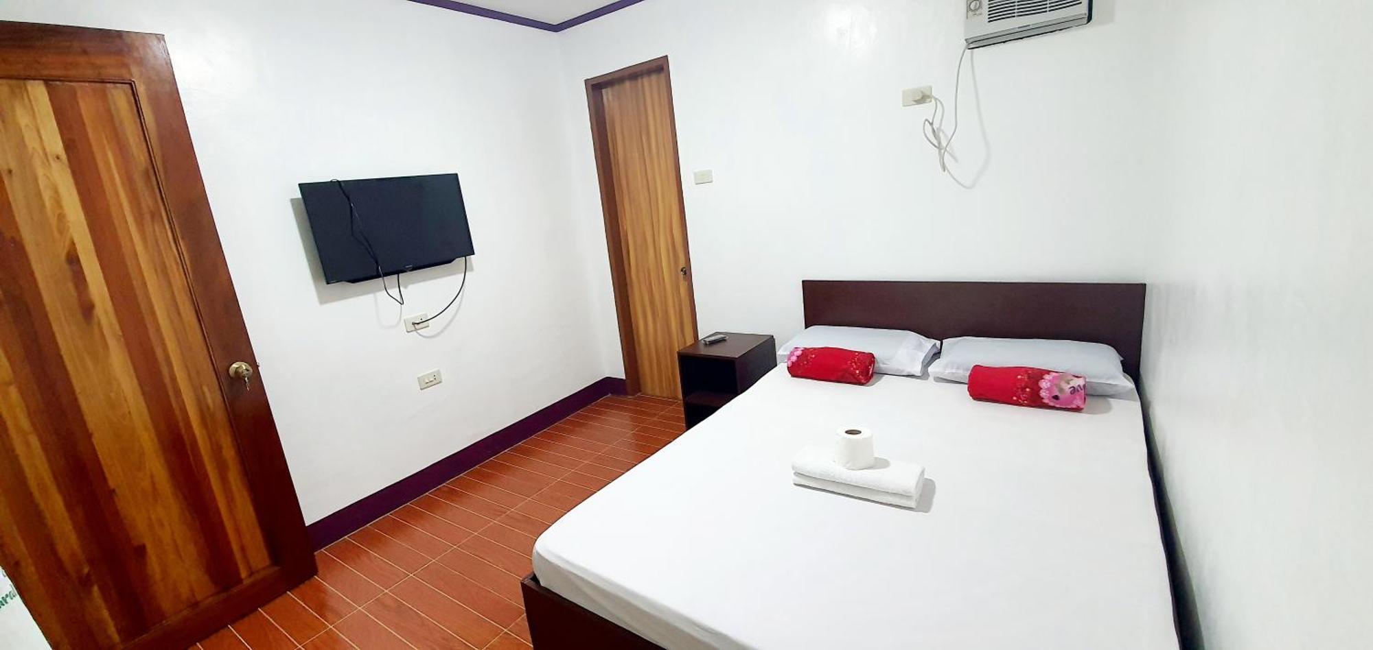 Sj Pabua Travellers Inn Mambajao 外观 照片